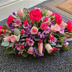 Pinks &amp; Purple Vibrant Casket Spray